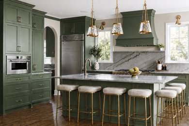 Inspiration for a large l-shaped medium tone wood floor and brown floor eat-in kitchen remodel in Charlotte with raised-panel cabinets, green cabinets, quartzite countertops, quartz backsplash, stainless steel appliances, an island and multicolored countertops