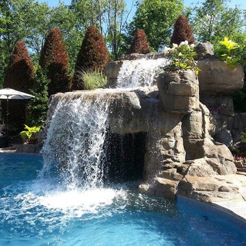 Faux Rock Concrete Waterfall with Swim Under Grotto