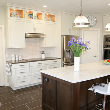 Transitional White Kitchen with Espresso Island