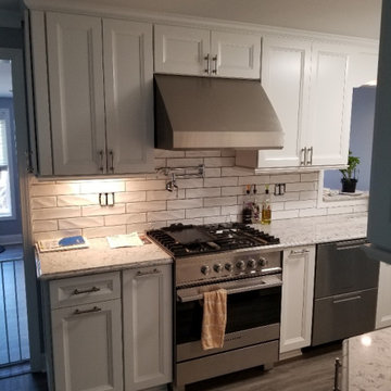 Traditional, white recessed panel kitchen