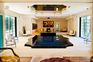 Example of a large minimalist indoor stone pool fountain design in Atlanta