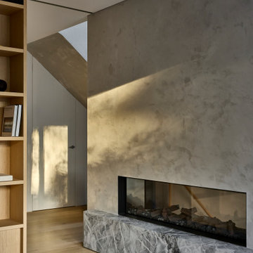 Family Lounge with Fireplace and Balcony Access