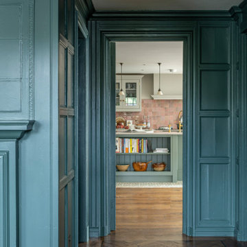 Hallway with painted panelled walls in a victorian villa renovation