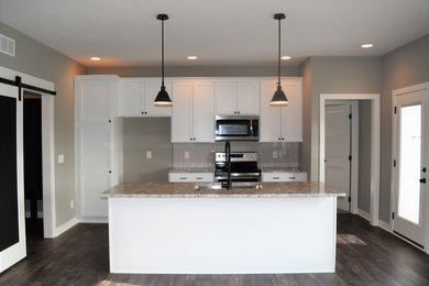 Kitchen - country kitchen idea in Other