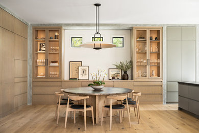 Dining room - contemporary light wood floor dining room idea in Charleston