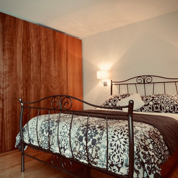 Home-made cherry panels bedroom with secret passage
