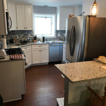kitchen remodel--white cabinets/granite countertops/floors