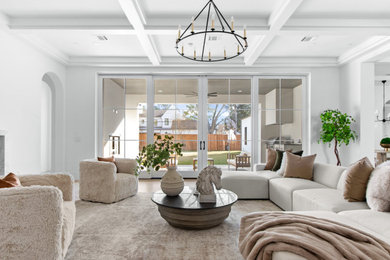 Example of a beach style living room design in Dallas