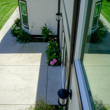 Windows, Stucco, Trim & Hardscape Installation