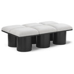 Meridian Furniture - Pavilion Black Boucle Fabric Bench, Cream, Black Finish, 54" W X 31" D X 17.5" H - Bring valuable seating and remarkable style to your space with this cream Pavilion Boucle Fabric Bench, an exquisite balance of style and usability for the entryway, bedroom, and beyond. Crafted from oak veneer with a black finish, this bench has a 4-inch-thick seat cushion that's channel-tufted for a touch of luxury. The bench's columnar bases add a dash of Art Deco design, making it a captivating focal point in any room.