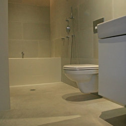 Concrete wall panels and bathroom floor.NYC.NY - Tile
