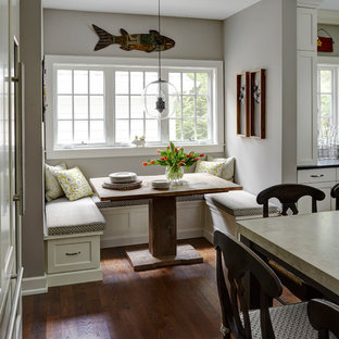 Design ideas for a large country open plan dining in Chicago with dark hardwood floors, brown floor and grey walls.