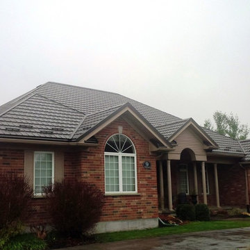 Houses with Hy-Grade's permanent steel roofing "cure"