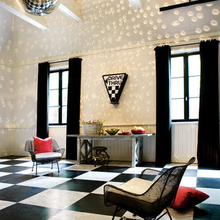 Photo of an expansive bohemian enclosed home cinema in Atlanta with white walls and lino flooring.