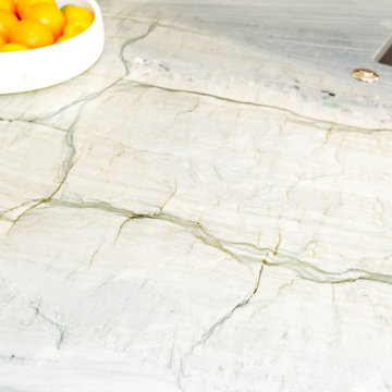 Foxtop Transitional Kitchen with Striking Quartzite Countertops