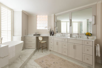 Inspiration for a transitional master white floor and double-sink freestanding bathtub remodel in Dallas with beige cabinets, beige walls, white countertops and a built-in vanity