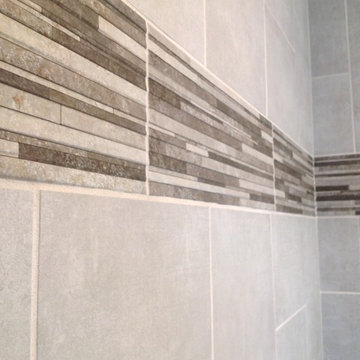 Tile border row in upscale tile shower in North Royalton ohoi