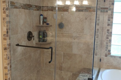 Bathroom - mid-sized modern master beige tile, multicolored tile and mosaic tile porcelain tile bathroom idea in Houston with raised-panel cabinets, medium tone wood cabinets, beige walls, an undermount sink and granite countertops