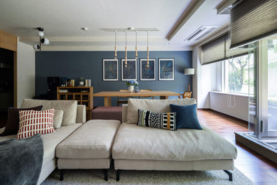 Inspiration for a rustic living room remodel in Tokyo