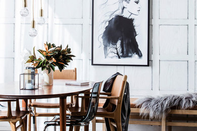 This is an example of a mid-sized eclectic dining room in Sydney.
