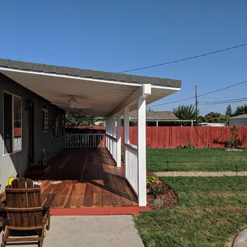 Southern Porch and Deck, Stamped Concrete and Landscaped Backyard
