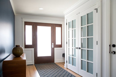 Inspiration for a transitional entryway remodel in Calgary