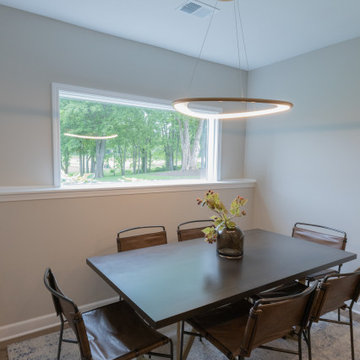 Lenexa, Kansas Basement Remodel with Speakeasy-Inspired Entertaining Bar