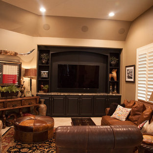 This is an example of a home cinema in Houston with plywood flooring and a built-in media unit.