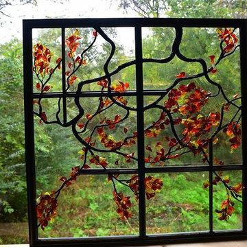 Kitchen stained glass window with flamed worked leaves.