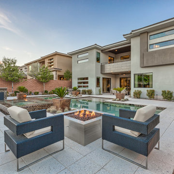 Lap Pool with Rim Flow Spa & Fire Pit