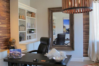 Inspiration for a modern freestanding desk study room remodel in Salt Lake City with white walls