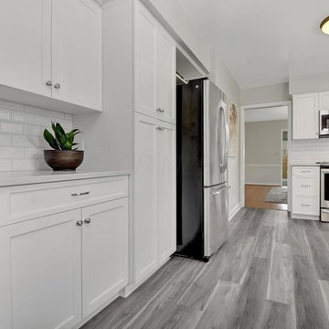 Transitional Kitchen Remodel Done in a Painted Maple Shaker Door