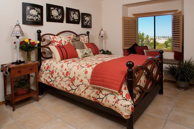 Inspiration for a mid-sized transitional guest ceramic tile and beige floor bedroom remodel in Austin with white walls and no fireplace