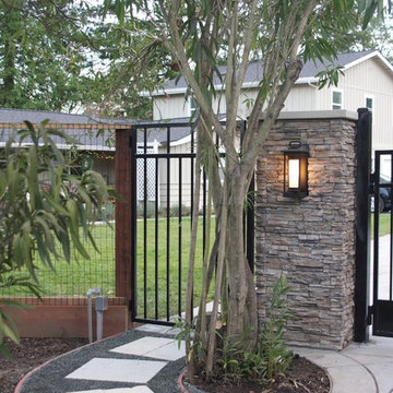 Gate with Stacked Stone Pillars