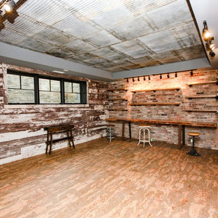 Large country look-out basement in Indianapolis with beige walls, painted wood flooring, no fireplace and red floors.