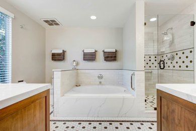 Bathroom - mid-sized 1950s master black and white tile and porcelain tile porcelain tile, white floor and single-sink bathroom idea in Los Angeles with recessed-panel cabinets, brown cabinets, a one-piece toilet, an undermount sink, quartz countertops, a hinged shower door, white countertops and a built-in vanity