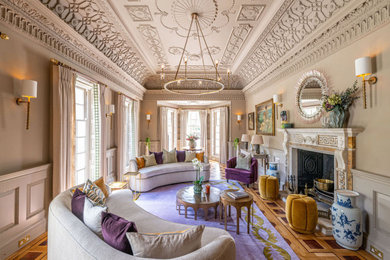 Classic formal enclosed living room in Other with beige walls.