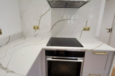 Design ideas for a modern kitchen in Surrey.