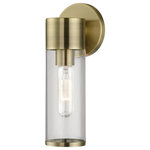 Livex Lighting - Banca 1 Light Antique Brass ADA Single Sconce - Add a dash of character and radiance to your home with this wall sconce. This single-light fixture from the banca collection features an antique brass finish with clear hand blown glass intentionally exposing the bulb inside for a trendy look.  The clean lines of the back plate complement the cylindrical glass shade adorned with detailed trim on top creating an industrial, sleek, urban look that works well in most of today s interiors. This fixture adds upscale charm and contemporary aesthetics to your home.