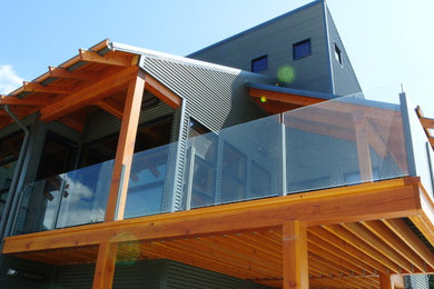 Inspiration for a contemporary deck remodel in Calgary