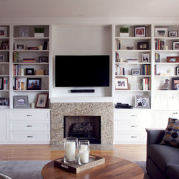 White-Painted Built-in around Fireplace and TV - Display And Wall Shelves 