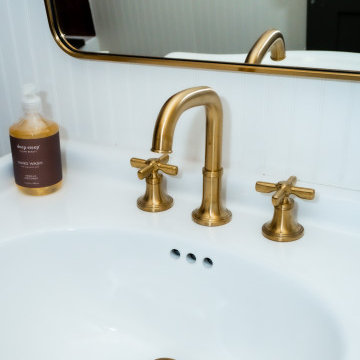 Transitional Guest Bathroom with Statement Tile, Wallpaper & Brass Fixtures