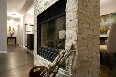 Example of a transitional living room design in Toronto
