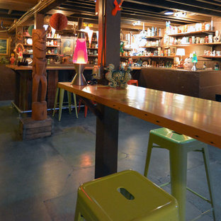 Inspiration for a bohemian basement in Portland with blue floors.