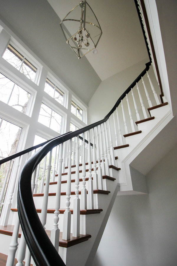 Powerful Impression by Floating Staircase in Suburban Foyer