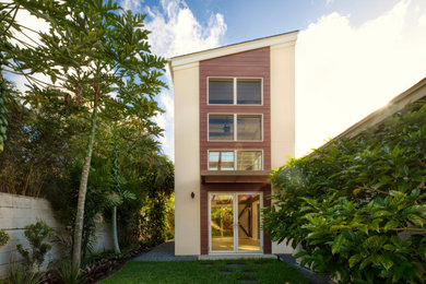 Example of a trendy home design design in Hawaii