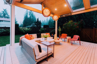 Deck - contemporary backyard ground level deck idea in Seattle