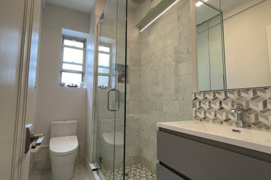 Inspiration for a marble floor and gray floor open shower remodel in New York with a bidet, white walls, an integrated sink and a niche