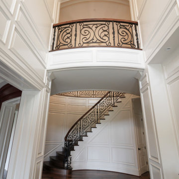 Project #74 | Circular Staircase with Hand-Forged Metal Panels