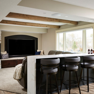 Example of a large transitional vinyl floor and brown floor home theater design in Minneapolis with gray walls
